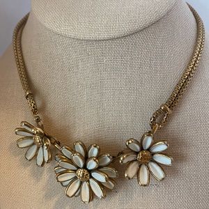 Flower and gold tone chain